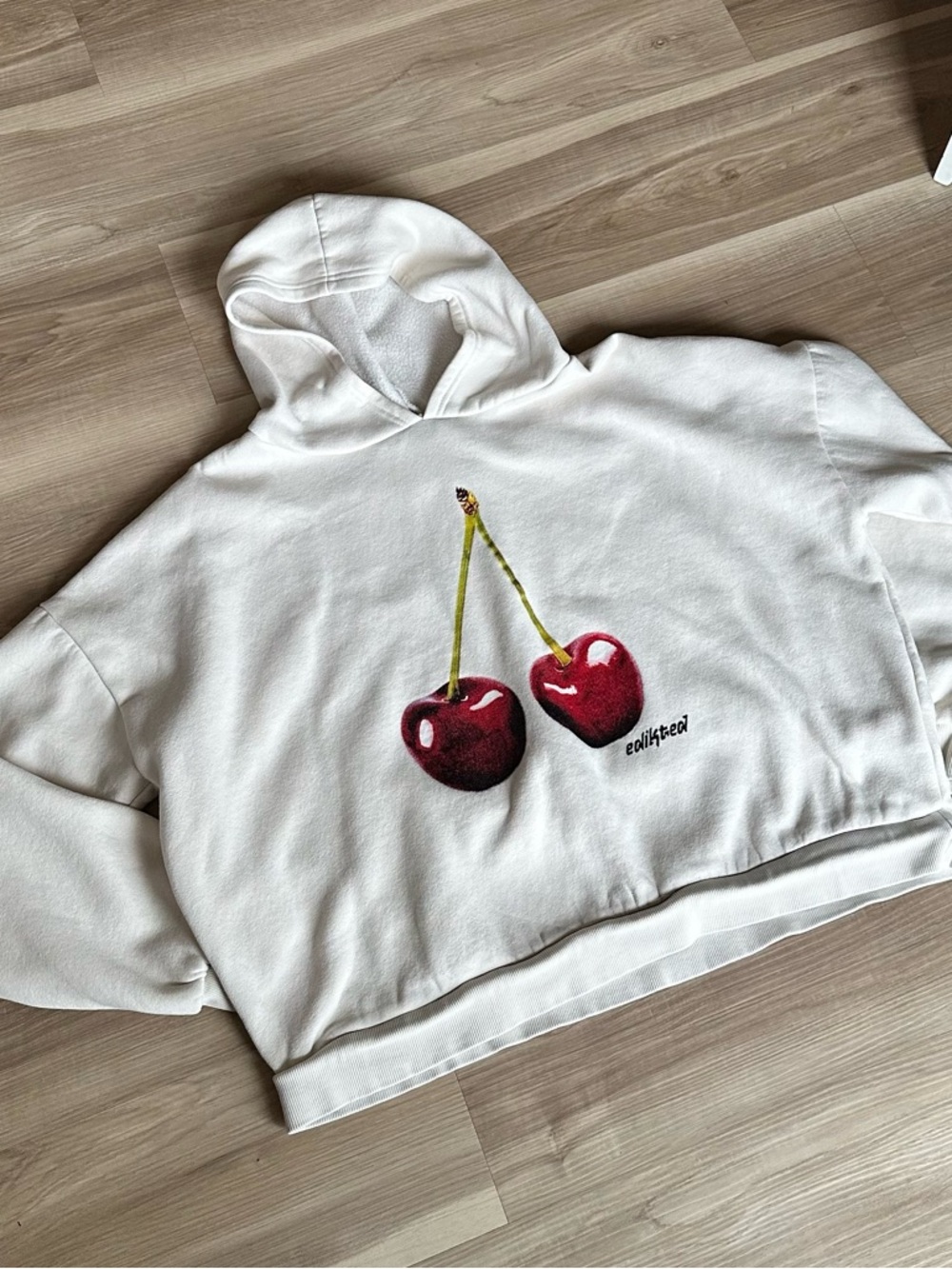 Edikted White Cropped Hoodie with Cherry Graphic